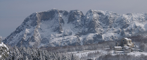 View of Urkiola Sanctuary with the Alluitz behind. Winter